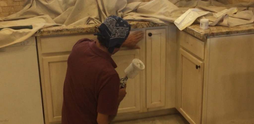 Sergio painting cabinets in arizona